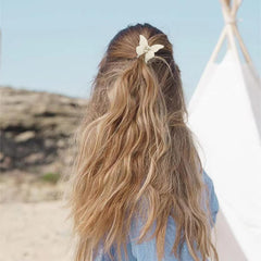 Atoden ganchos de pelo mariposa para lavar rostro, evitando deslizamientos.