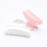Brinie pinza de pelo rosa, clip claw frontal, sujeción suave para peinados rápidos.