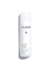 Caudalie bruma facial agua de uva, botella elegante para hidratación instantánea.
