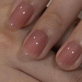 Curvlife uñas rosa durazno oval con diseño para un acabado elegante