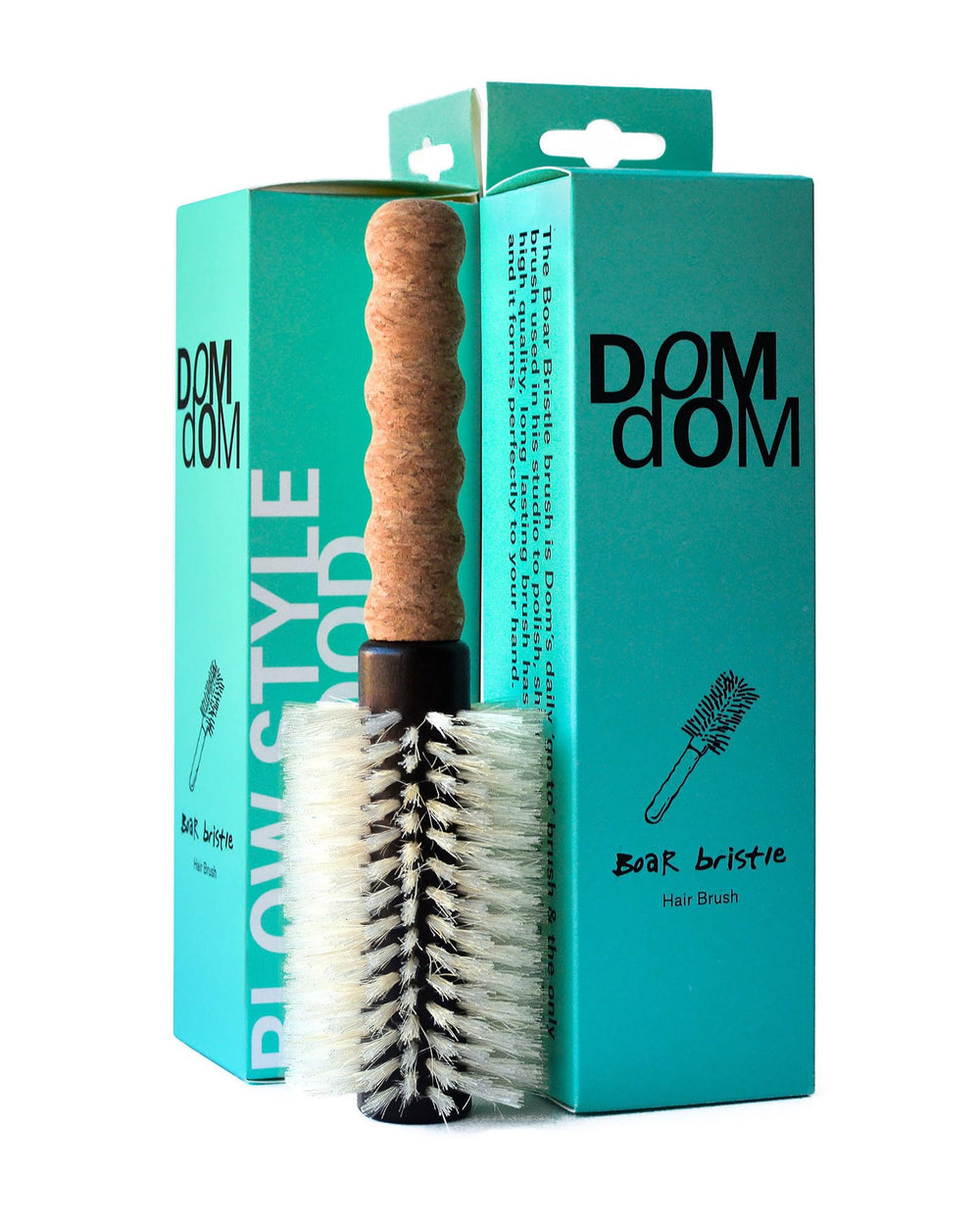 Dom Dom cepillo redondo para secado con volumen de 2,3 pulgadas y acabado suave.