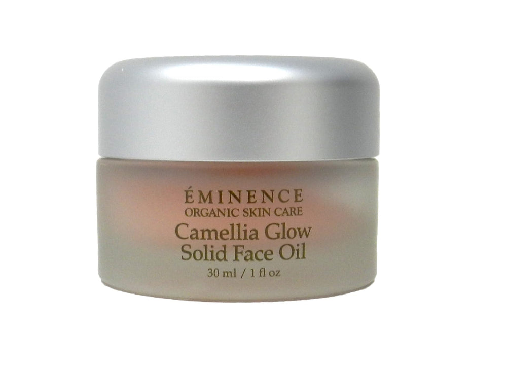 Eminence Camellia Brillo: textura de aceite sólido en bote para hidratar y aportar brillo suave.
