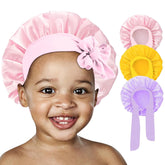 Gorra FIRSTPELLA para niñas en rosa, sueño suave y protección del cabello durante la noche.