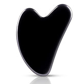 Guasha de FUIYOOCEN en obsidiana natural para un contorno facial suave y efectivo.