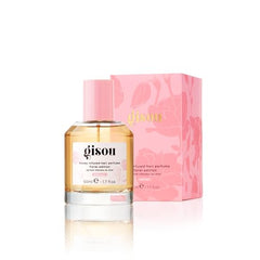 Aplicación en spray Gisou para perfumar y hidratar el cabello