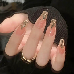 Uñas postizas Hkanlre en forma ataúd doradas, acabado brillante para ocasiones.