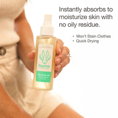 HUME SUPERNATURAL Dry Body Oil Spray demonstrates lightweight texture for non-greasy moisture.