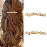 Barrette Kefley de perlas doradas para un look elegante en cualquier ocasión.