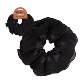 Kitsch coletero plisado negro con textura elegante para peinados duraderos