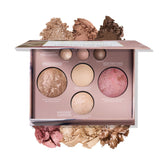 Paleta horneada Laura Geller New York para sombras neutras, ideal para looks diarios.