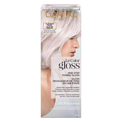 L'Oreal Paris Le Color Gloss botella tono platino, neutraliza amarilleo y realza el brillo.