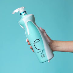 Malibu C Un-Do-Goo champú clarificante, frasco que transmite limpieza profunda sin sulfatos.