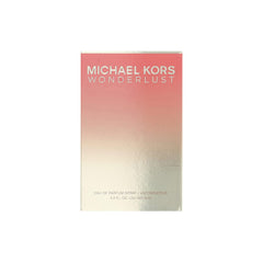 Detalle del tapón de Michael Kors Wonderlust, lujo y precisión en cada nota