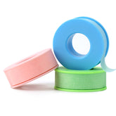 Obeyalash tres rollos verde, azul y rosa para fijación cómoda.