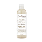 Botella SheaMoisture con espuma de coco virgen para hidratación suave.