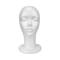 Cabeza maniquí STUDIO LIMITED de espuma blanca para exhibir pelucas con precisión.