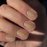 Tyuimhx Uñas postizas doradas con brillo en formato cuadrado corto para uso diario