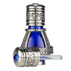 3 ARCHES USA: frasco azul cobalto con aceite de unción spikenard para rituales.