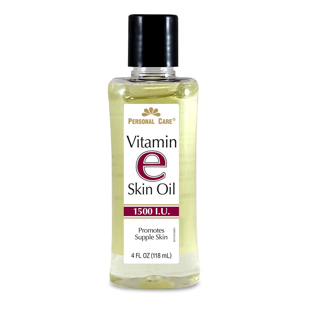Aceite para la piel con Vitamina E en botella, hidrata y suaviza la piel.