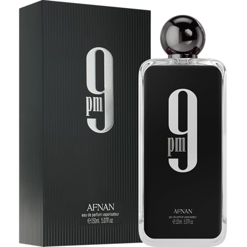 Afnan 9 PM Rebel aromas ambarados y maderosos, con base duradera.