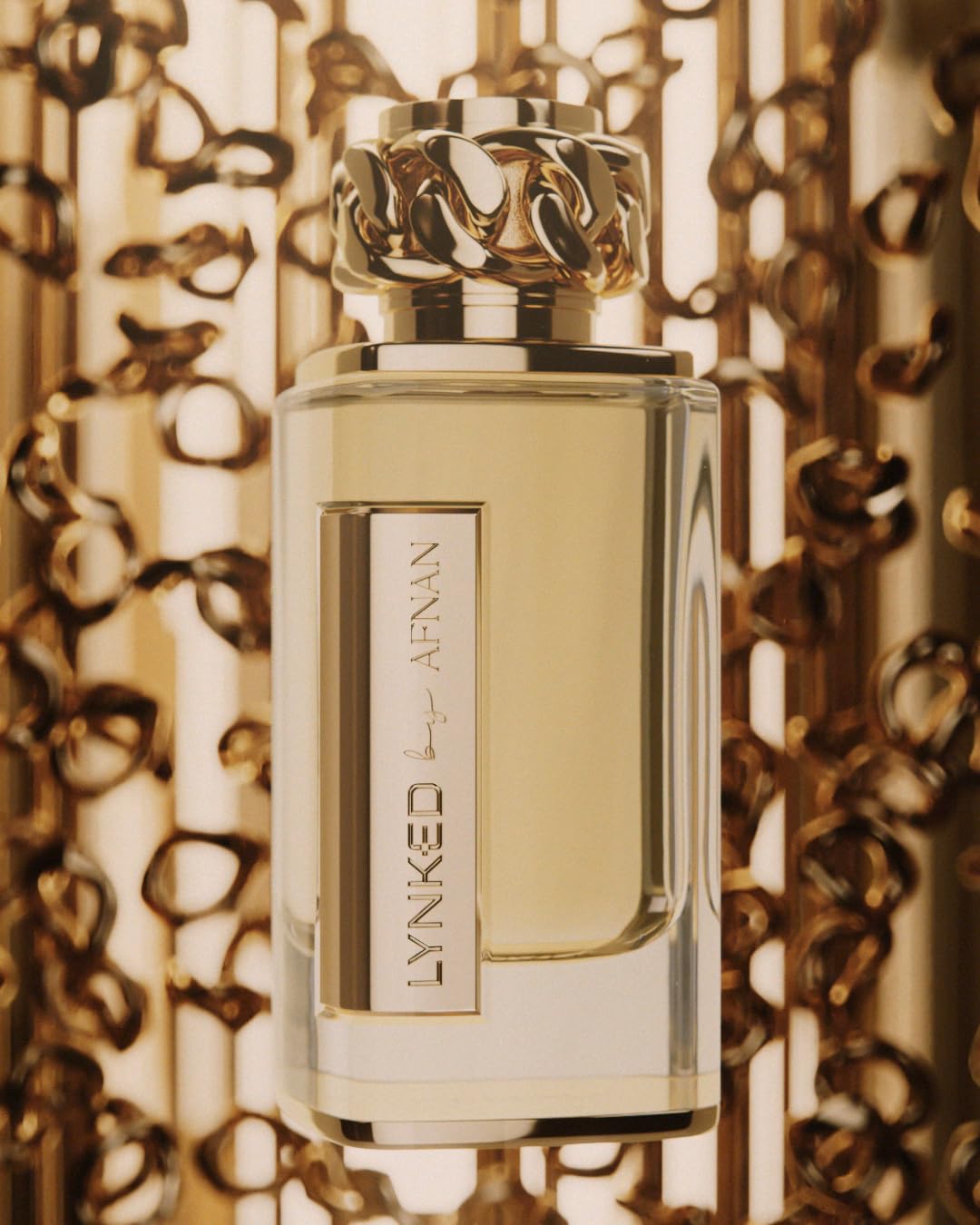 Afnan Lynked Forever Gold packaging artfully blends bold typography with refined elegance.