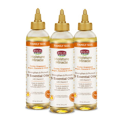 African Pride Moisture Miracle: botella-vertido, hidratación ligera para el cabello y cuero cabelludo.