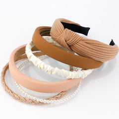 Diadema AHONEY con nudo para un toque elegante.