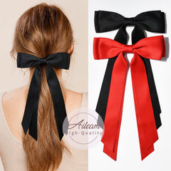 Lazo satinado Aileam en detalle para looks elegantes.