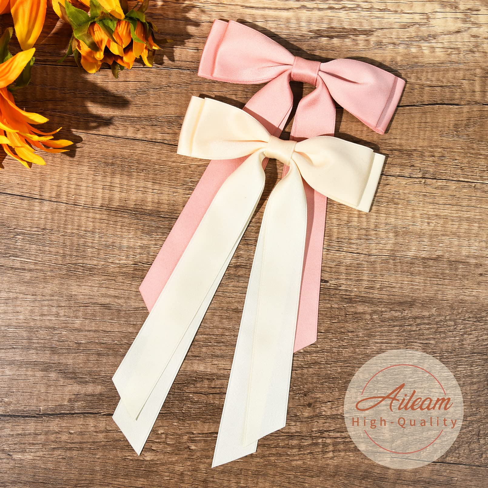 Lazo satinado rosa claro de Aileam, ideal para looks femeninos.