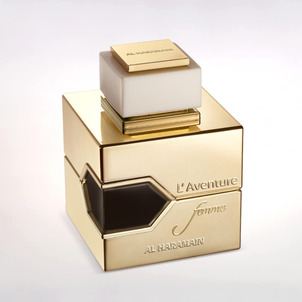 Al Haramain L'Aventure Femme, capuchón claro, experiencia aromática suave para relajación.