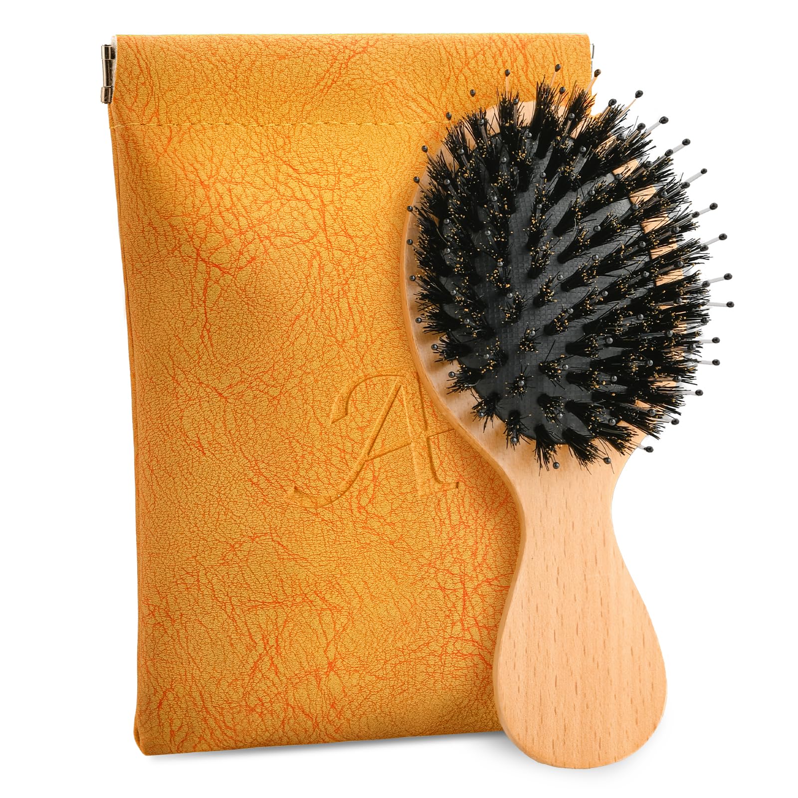 Ancable mini cepillo de cabello con cerdas de jabalí, perfecto para retoques en viaje.