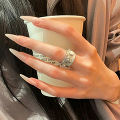 AROVFAM uñas estilete tono neutro con acabado brillante para uso diario.