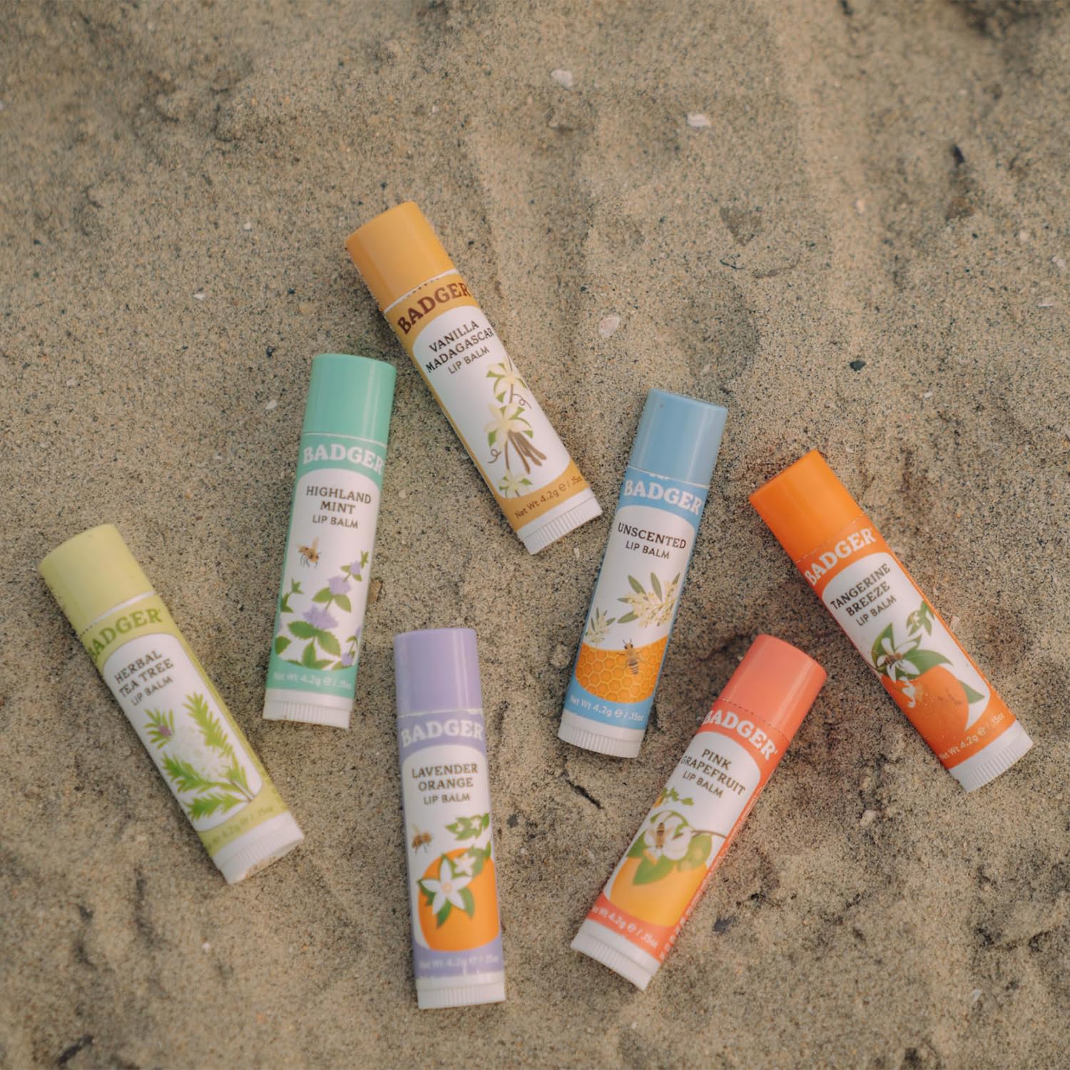Close-up of Badger Unscented Lip Balm tube with fragrance-free formula for sensitive lips