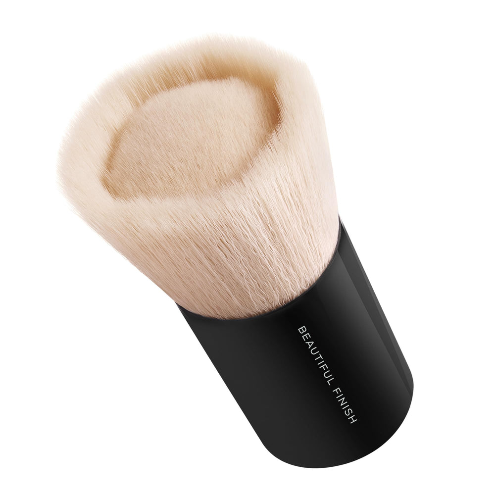 Brocha bareMinerals con fibras sintéticas para aplicación homogénea.