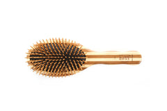 Cepillo Bass Verde con pines de bambú para cabello suave.