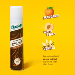 Batiste Dark Dry Shampoo spray demonstrates quick root refreshing.