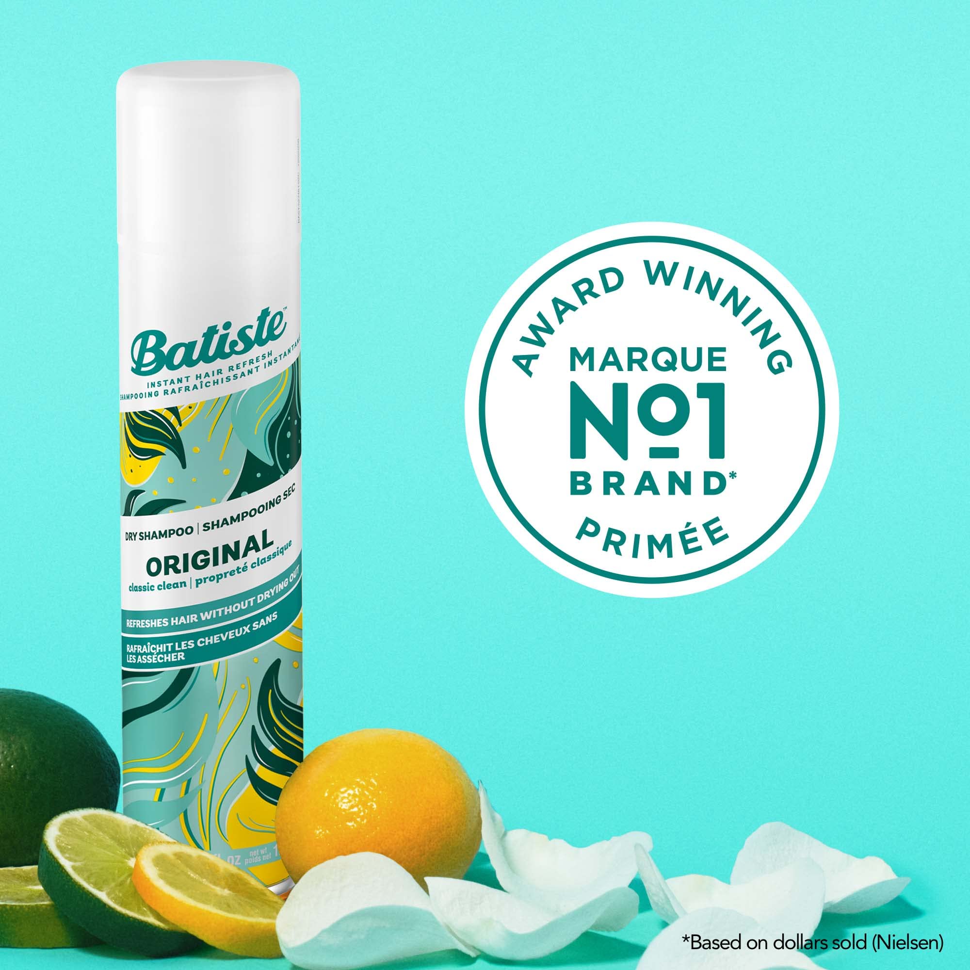 Aplicación rápida de Batiste Champú Seco Original para revitalizar cabellos cansados.