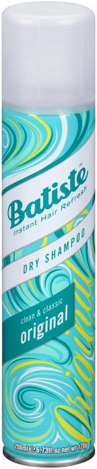 Batiste Shampoo Seco Original en botella; revitaliza el cabello y deja aroma clásico para uso diario.