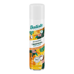 Batiste Tropical Dry Shampoo bottle close-up absorbs oil for a refreshed look.
