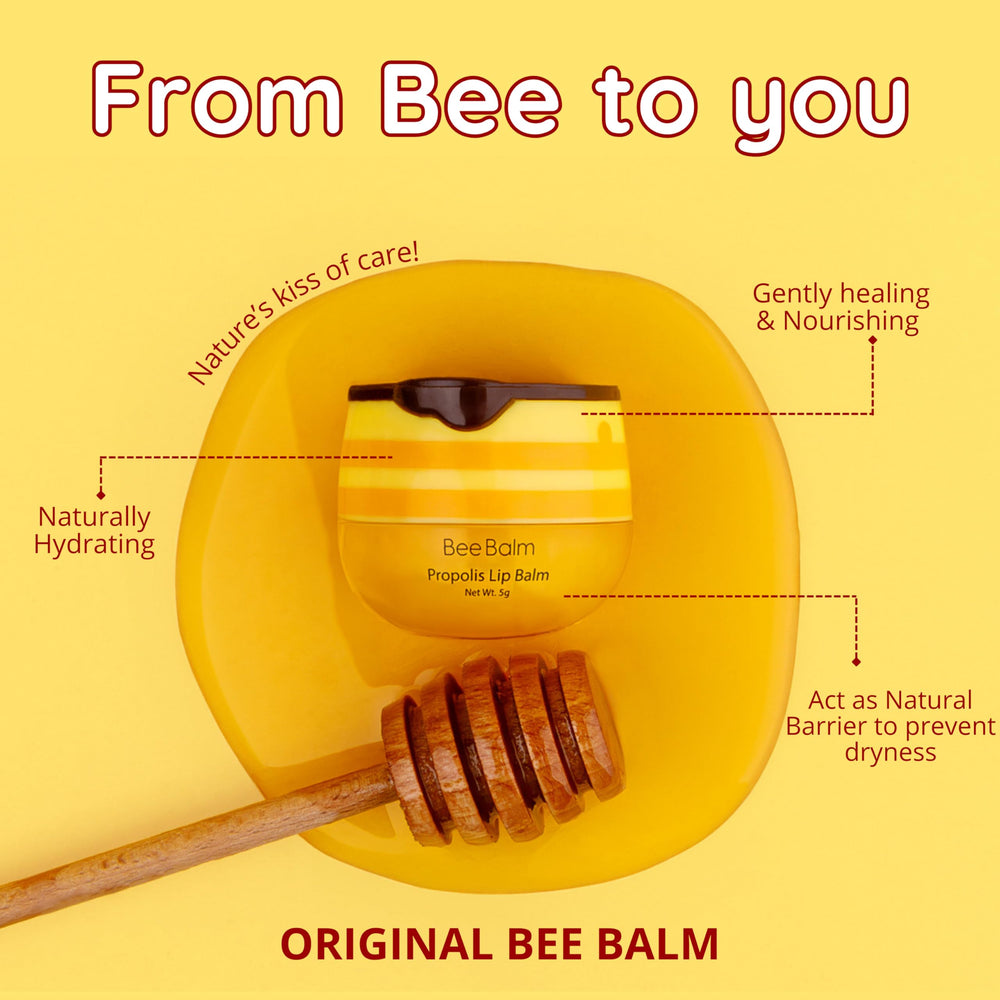 Bee Balm Original Lip Balm on hand for portable everyday use.