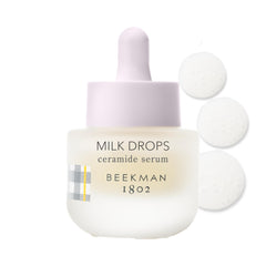 Beekman 1802 Milk Drops Serum en bote, textura ligera para hidratación duradera.
