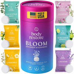 Body Restore Bloom empaque de tubo, ideal para regalo y relajación en casa.