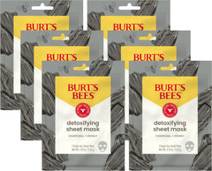 Burts Bees mascarilla de carbón desenrollada sobre el rostro para limpieza profunda