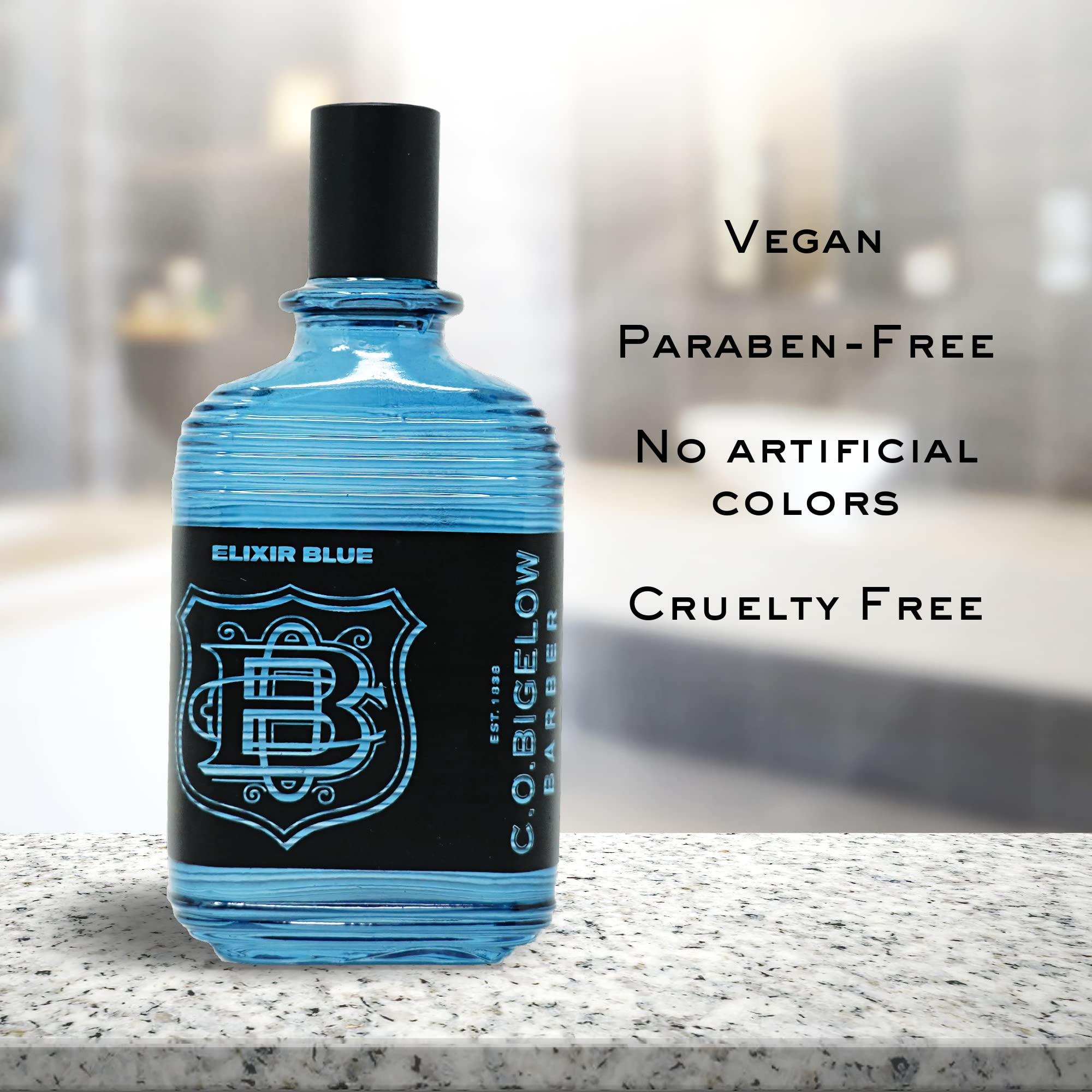 Aroma limpio y moderno de C. O. Bigelow Elixir Blue acompaña conjuntos casuales, de oficina y de noche.