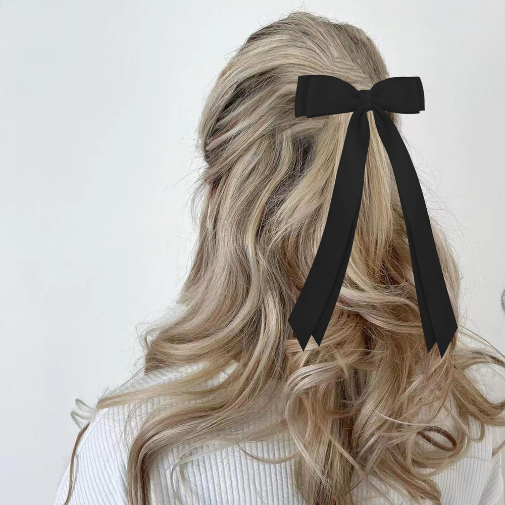 Canitor lazo cabello rosa, ideal para outfits juveniles y preppy.