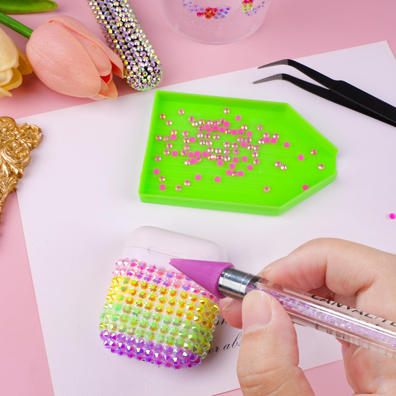 CANVALITE storage box with 15 compartments keeps rhinestones organized.
