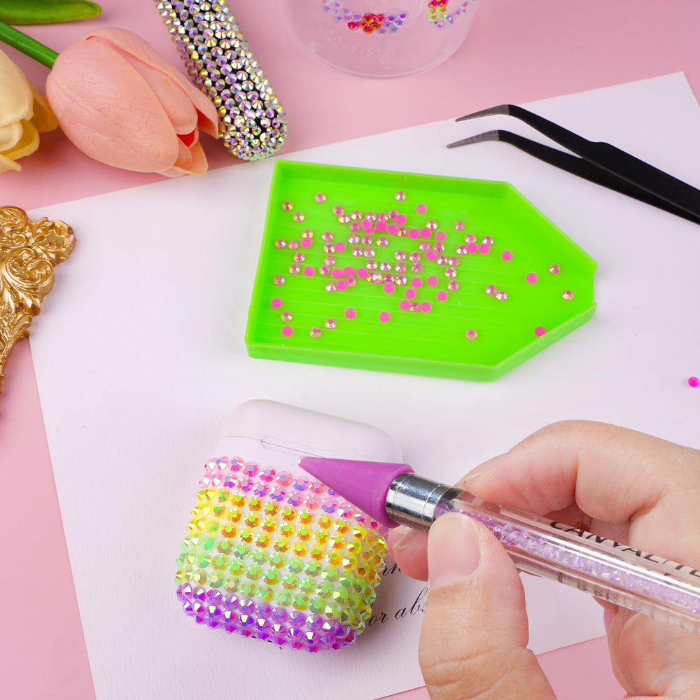CANVALITE storage box with 15 compartments keeps rhinestones organized.