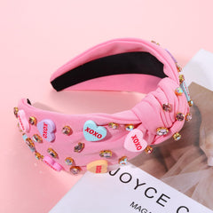Diadema CEALXHENY con corazón rosado aporta toque romántico para cualquier conjunto.