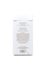 Textura cremosa de Crabtree & Evelyn Sweet Orange Hand Therapy para suavizar manos.
