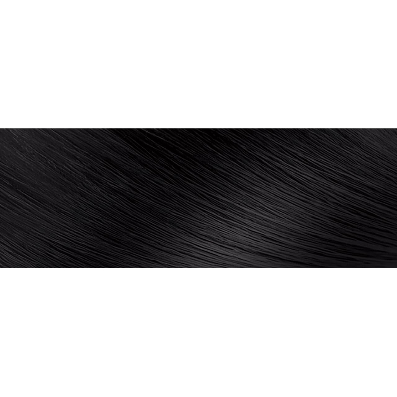 Cabello con color Creme of Nature, acabado brillante y suave, resultado duradero.
